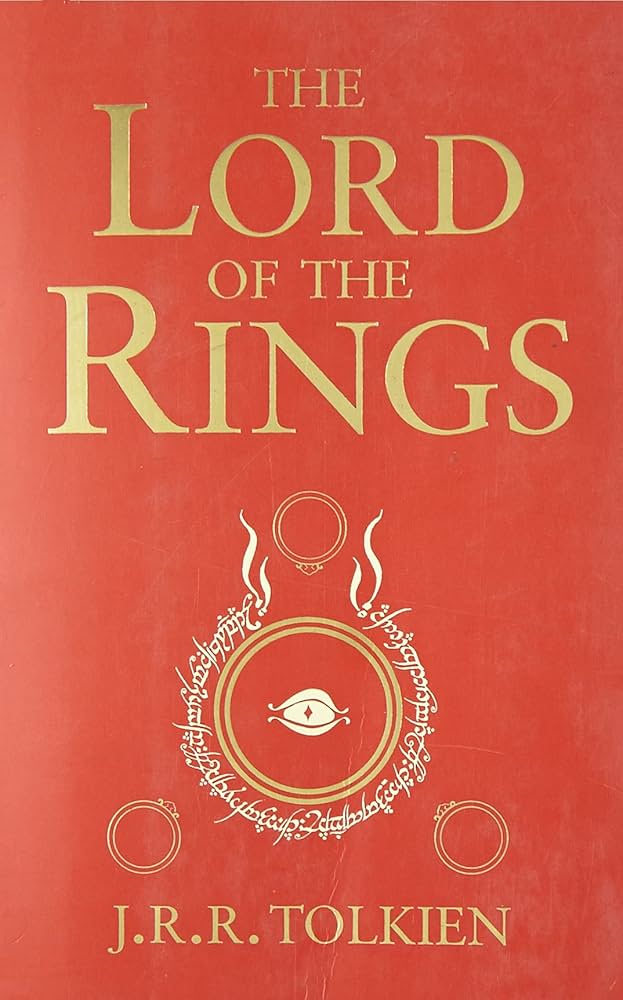 Cover of The Lord of the Rings with a red design and ornate central emblem.